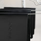Black leather menus hanging on a chrome rack